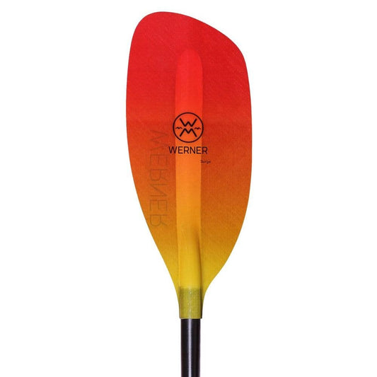 The Surge by Werner Paddles is a red and yellow kayak paddle blade with a black shaft, showcasing the Powerhouse Blade design ideal for whitewater adventures.