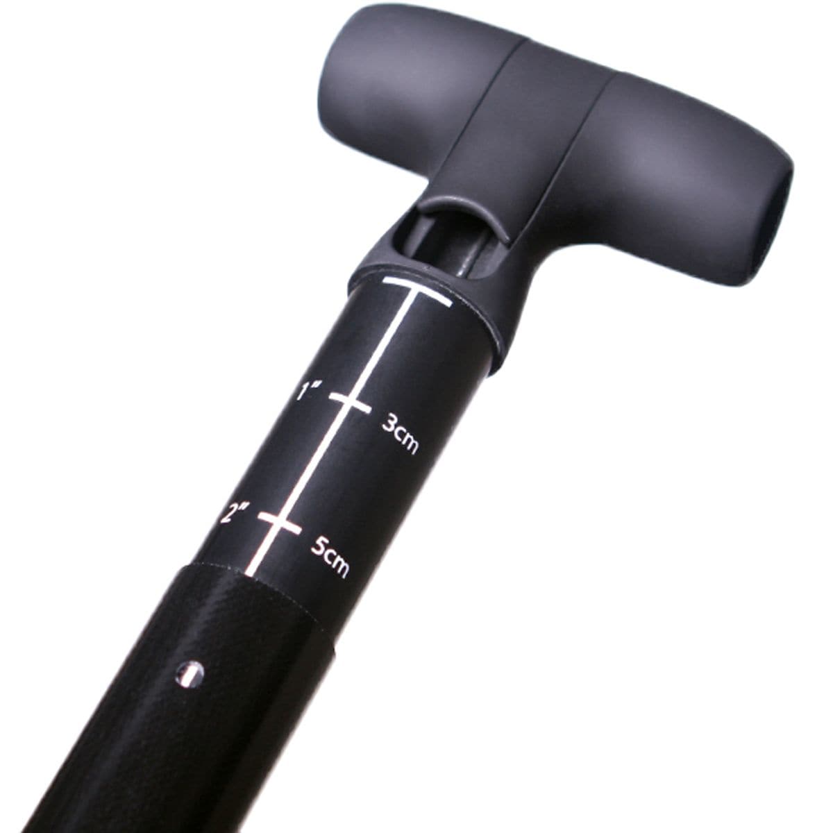 A close-up of the black Rip Stick Stand Up Paddle by Werner Paddles, featuring measurement markings in inches and centimeters on the shaft, reminiscent of a surf blade's precision, with a contoured handle.