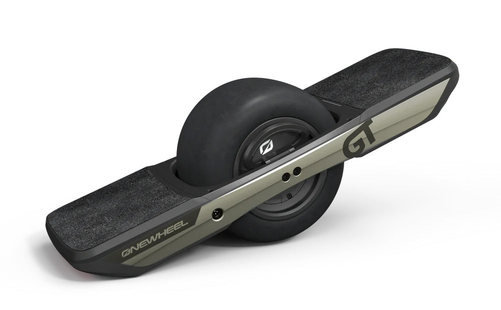 A sleek, black Onewheel GT electric skateboard with a single large tire in the center and footpads on either side.
