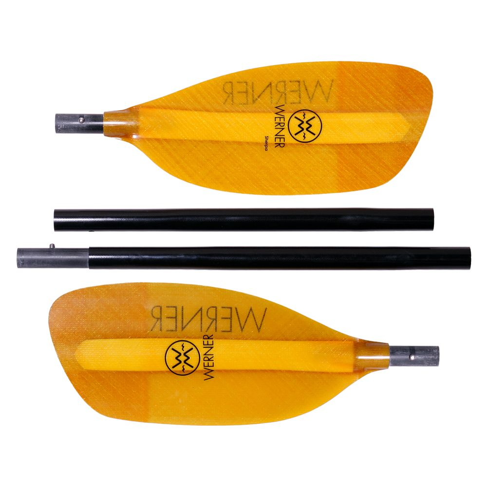A pair of yellow paddles with a black handle.