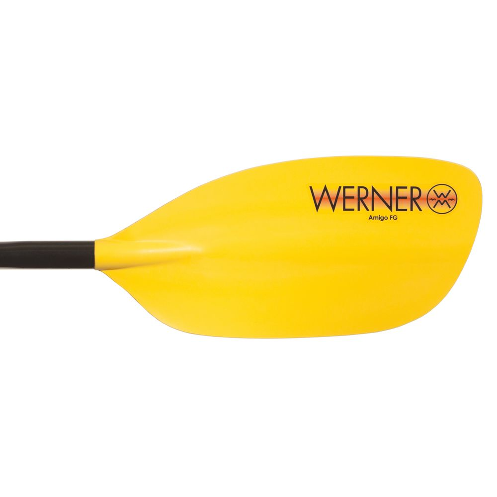 This image shows a yellow Werner kayak paddle blade with black text and handle.