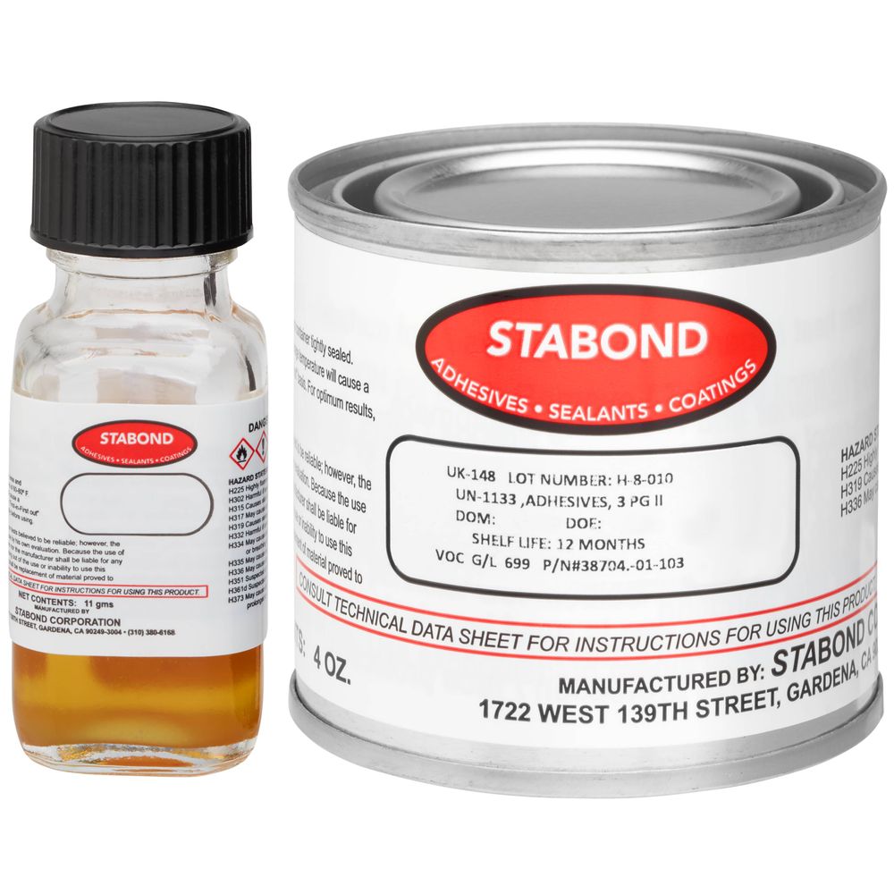 Image of two containers of STABOND adhesive products, one small clear bottle with an amber liquid and a larger metal can labeled "STABOND ADHESIVES SEALANTS COATINGS." Both containers display safety information.