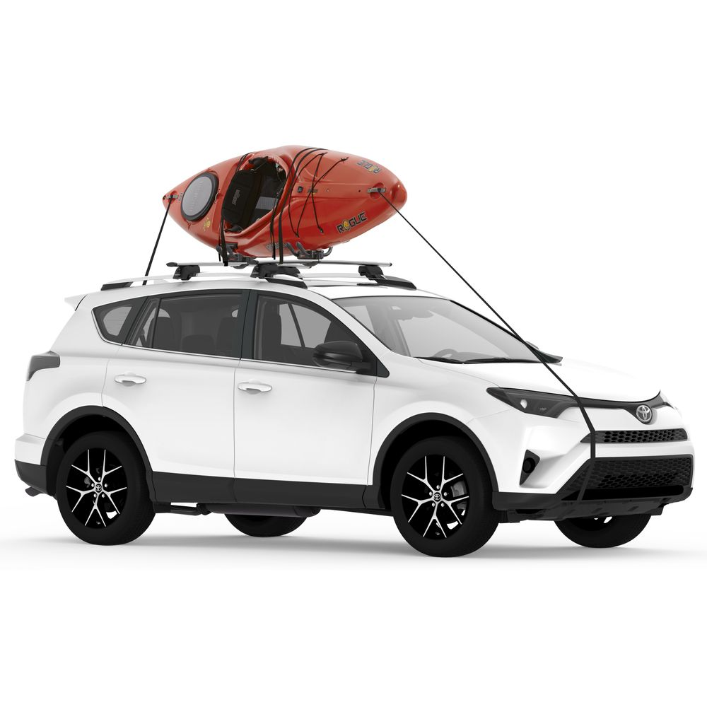 A white toyota rav4 with a kayak on top.