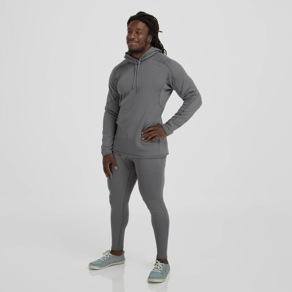 A person stands against a plain white background wearing an NRS Lightweight Hoodie for men, featuring moisture-wicking comfort, matched with gray sweatshirt and leggings, and teal sneakers.