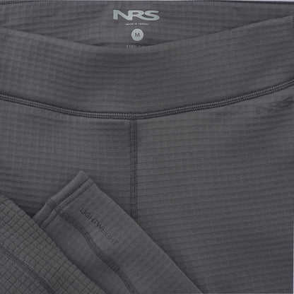 Close-up of dark gray NRS Lightweight Pants - Women's textile fabric, featuring visible stitching and texture. A size "M" label highlights its moisture-wicking properties, perfect for active wear.