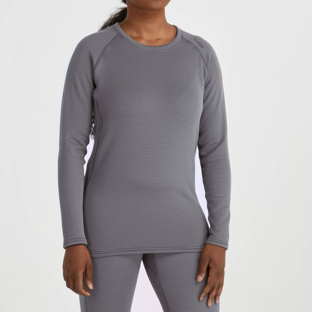 A person wears a long-sleeve gray NRS Lightweight Shirt - Women's, featuring matching leggings, expertly crafted for moisture wicking and sun protection.