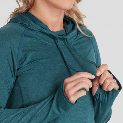 A person in an NRS Silkweight Vesi Hoodie for women, dressed in teal, adjusts the drawstrings and appreciates the garment's breathability and UPF 50+ sun protection.