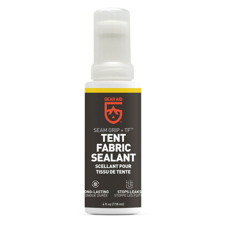 A 4 oz bottle of Gear Aid Seam Grip + TF Tent Fabric Sealant, with white cap and black label, is designed to stop leaks and provide long-lasting waterproofing for tent floors and outdoor gear.