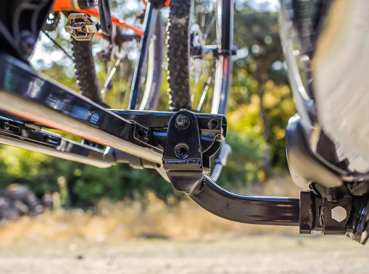 a close up of a Yakima HoldUp Bike Rack with a bike attached to it.