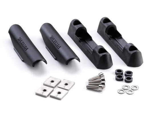a set of Yakima Landing Pads and hardware for a motorcycle.