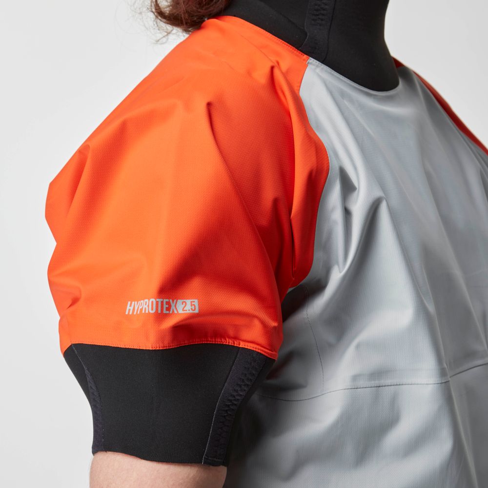 A person wears the NRS Stratos Short Sleeve Paddling Jacket, featuring orange and grey panels, "HYPROTEX 2.5" on the sleeve, and neoprene neck and arm seals for added protection.