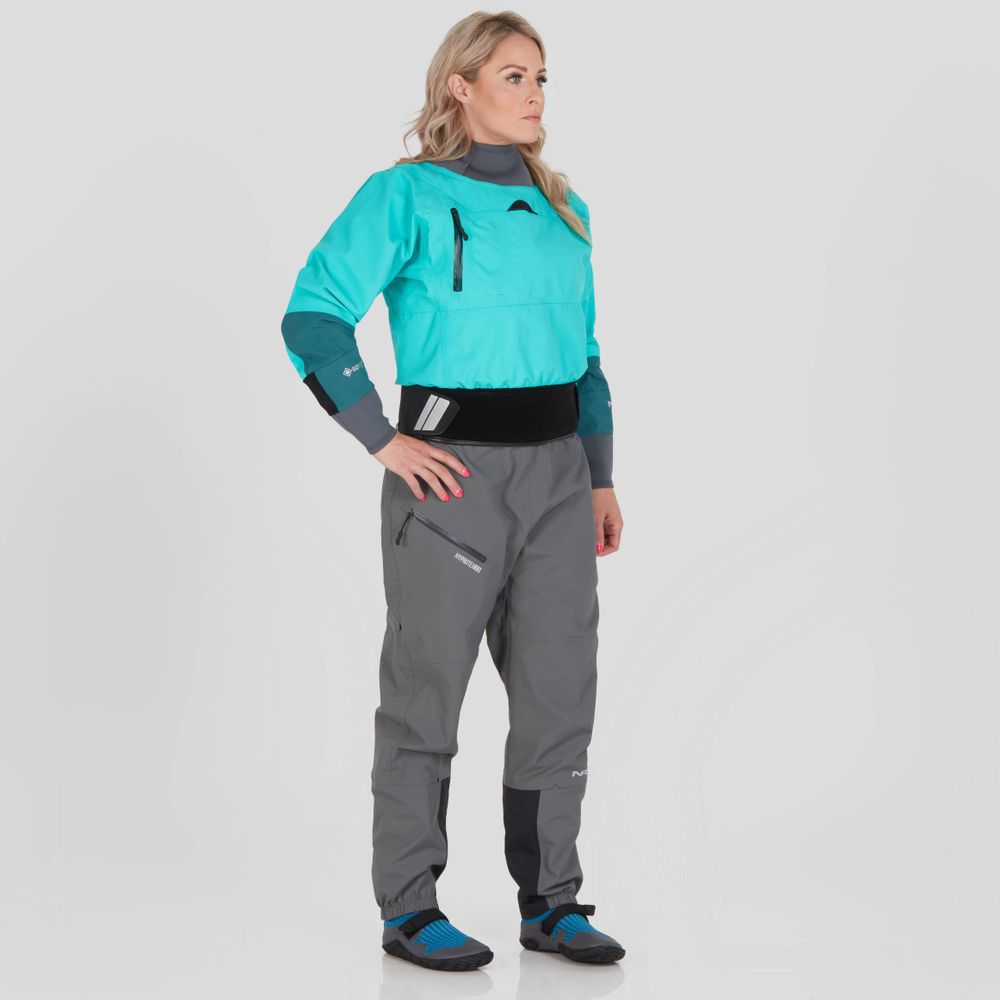 A woman wears the NRS REV (GORE-TEX Pro) Drytop in turquoise and gray with black accents, highlighting its waterproof breathable performance, against a plain background.