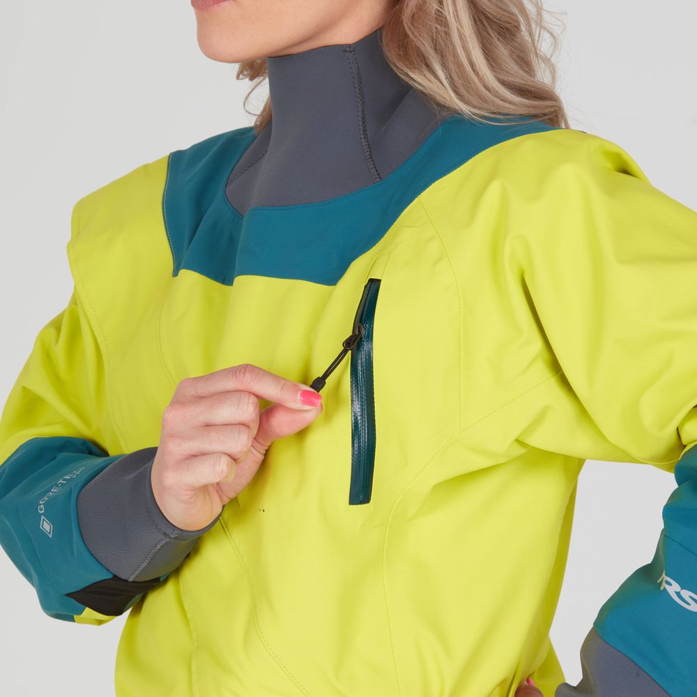 In a Nomad GORE-TEX Pro Semi-Dry Suit for women by NRS, in bright yellow and teal, the person adjusts the zipper of a small chest pocket.