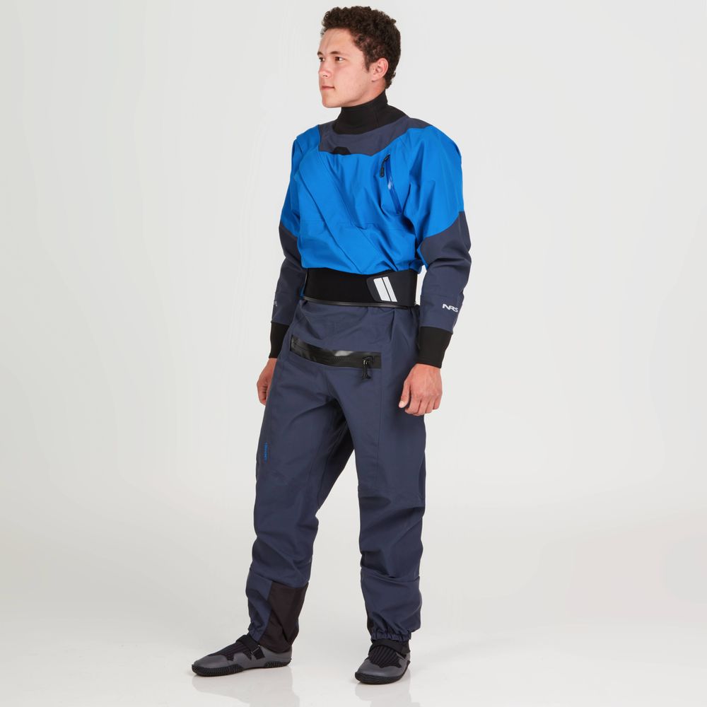 A person models the NRS Axiom (GORE-TEX Pro) Drysuit - Men's, set against a plain background, demonstrating its waterproof, windproof, and breathable properties.