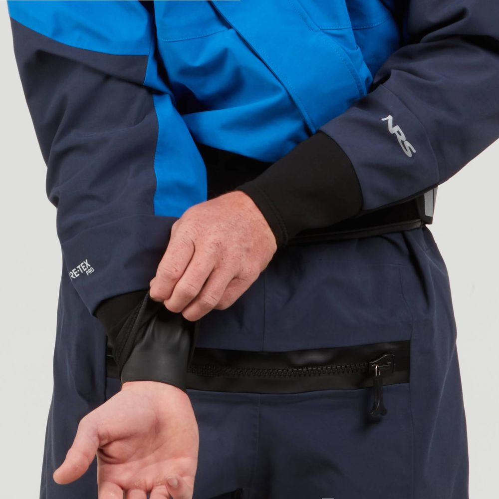 A person carefully adjusts the wrist seal of an NRS Axiom (GORE-TEX Pro) drysuit for men, made from recycled nylon, to maintain its waterproof, windproof, and breathable features for optimal protection.