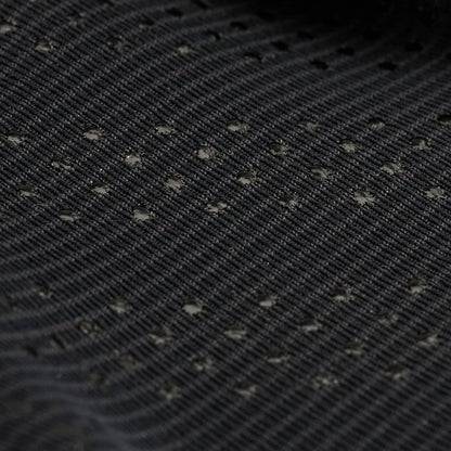 Detailed view of the NRS Hydroskin 0.5mm Men's Gloves showcasing black fabric with a textured pattern and small perforations, enhanced by a neoprene core for exceptional durability.