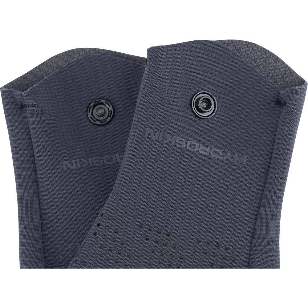 Close-up of the dark gray sleeves with snap buttons on NRS Hydroskin 0.5mm Gloves - Women's, showcasing their neoprene core and "HYDROSKIN" label, ideal for cold water paddling.
