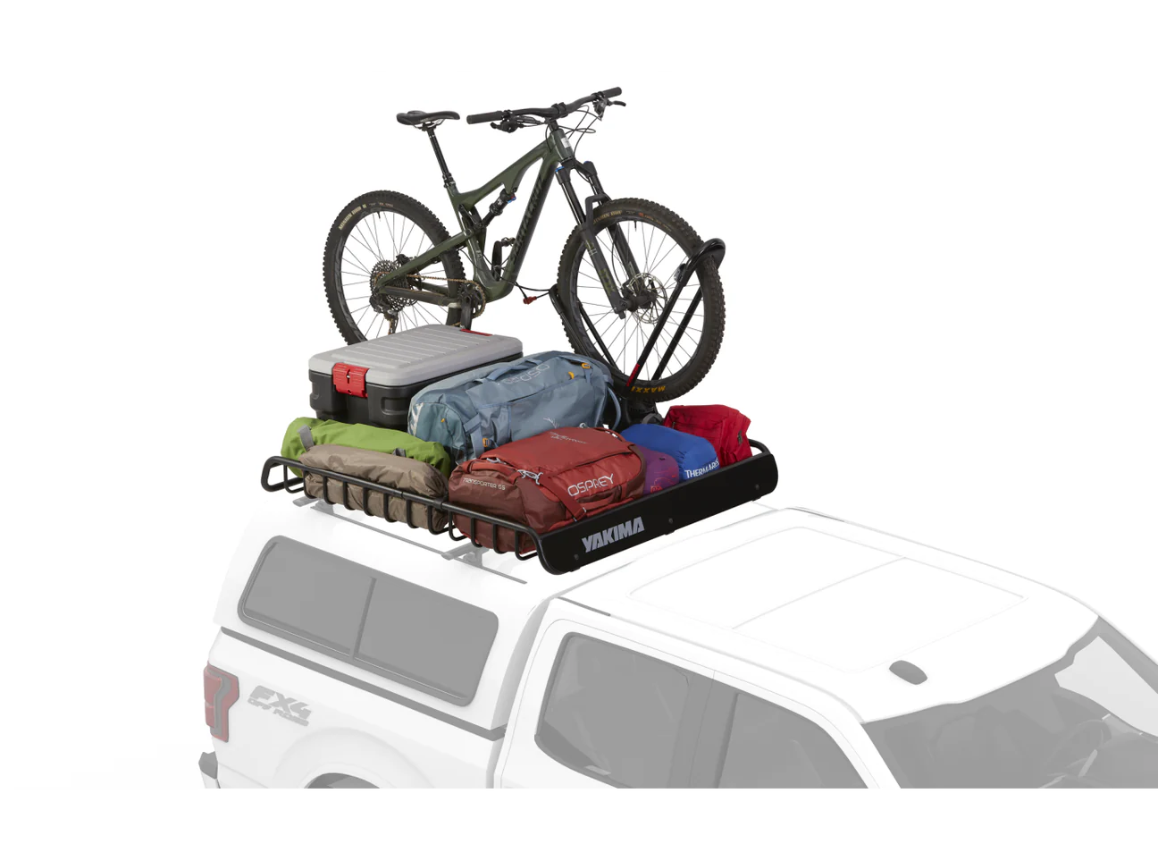 A Yakima Mega Warrior bike rack on top of a vehicle.