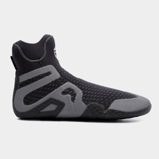 The NRS Freestyle WetShoe, available in black and gray, is crafted with Terraprene neoprene and features a textured rubber sole plus an elastic ankle collar, making it ideal for water sports.
