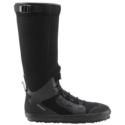 The NRS Boundary Boot is a tall, black waterproof boot with a neoprene upper, rubber sole, and reinforced toe and heel. Its rugged sole ensures durability on rough terrains, and a Velcro strap at the top allows for easy adjustment.