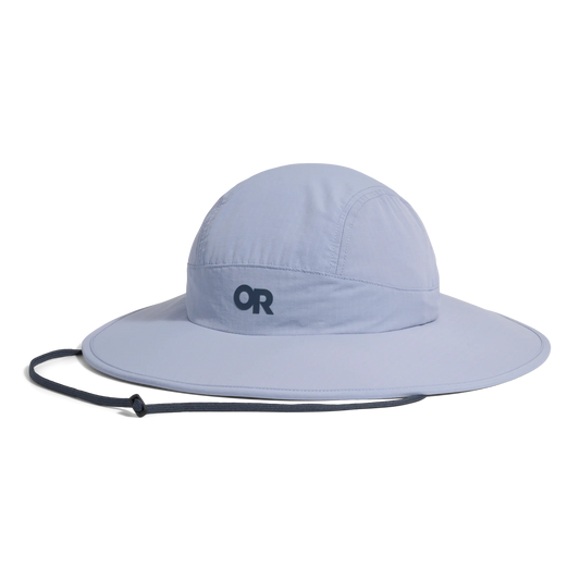 The Outdoor Research Oasis Sun Sombrero is a light gray wide-brim hat with a chin strap and UPF 50+ protection, featuring "OR" on the front. Displayed on a plain white background.
