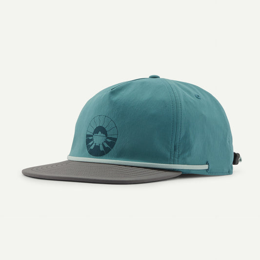 The Patagonia Merganzer Hat is a teal baseball cap with a gray brim, adorned with a mountain and sun graphic.