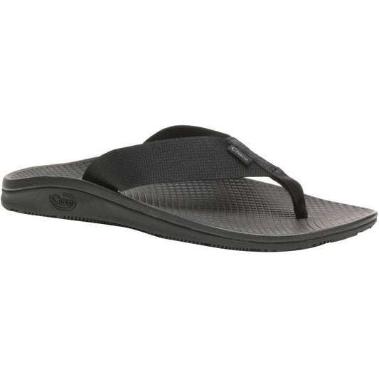 The Chaco CLASSIC FLIP - WOMEN'S sandal features a black fabric thong strap, textured sole, and arch-supporting comfort, shown on a white background.
