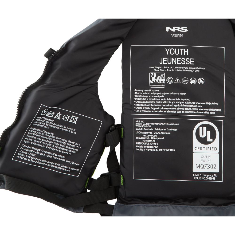 Close-up of an NRS Crew Youth PFD, showcasing the inner label with care instructions and the US Coast Guard Type III Certification mark.