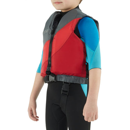 A child wearing an NRS Crew Child PFD, a US Coast Guard Certified red and grey life jacket, stands confidently against a plain white background in a blue wetsuit.