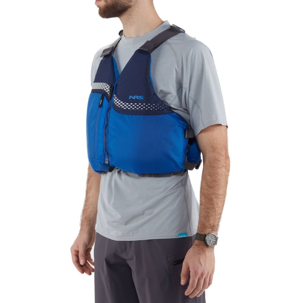 An individual in a blue Vista PFD by NRS over a gray shirt, shown from the waist up and slightly to the side, illustrates how a beginner's personal flotation device ensures essential safety.