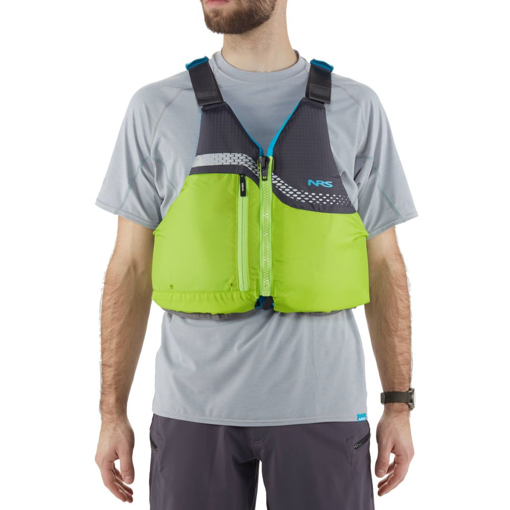 An individual dons an NRS Vista PFD life jacket, US Coast Guard-certified, over a light gray shirt and dark gray pants against a white backdrop.