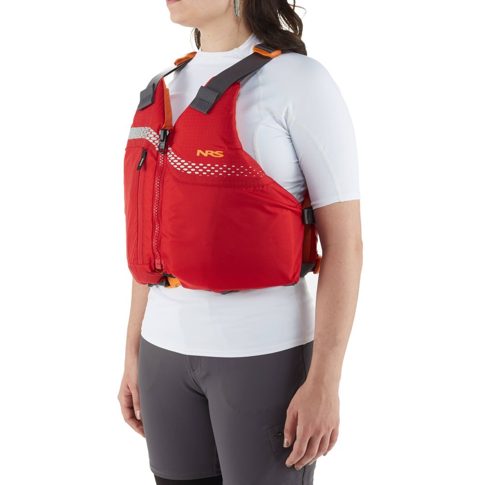 A person wearing an NRS Vista PFD over a white shirt and gray pants.