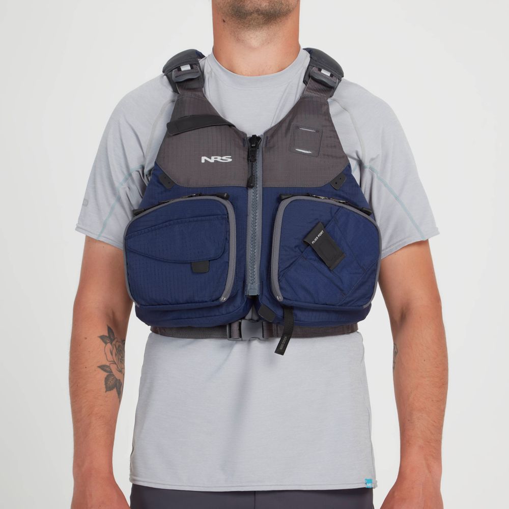 Sporting a Chinook Fishing PFD by NRS in grey and blue, this person has front pockets and gear attachment points for convenience, worn over a light grey shirt.