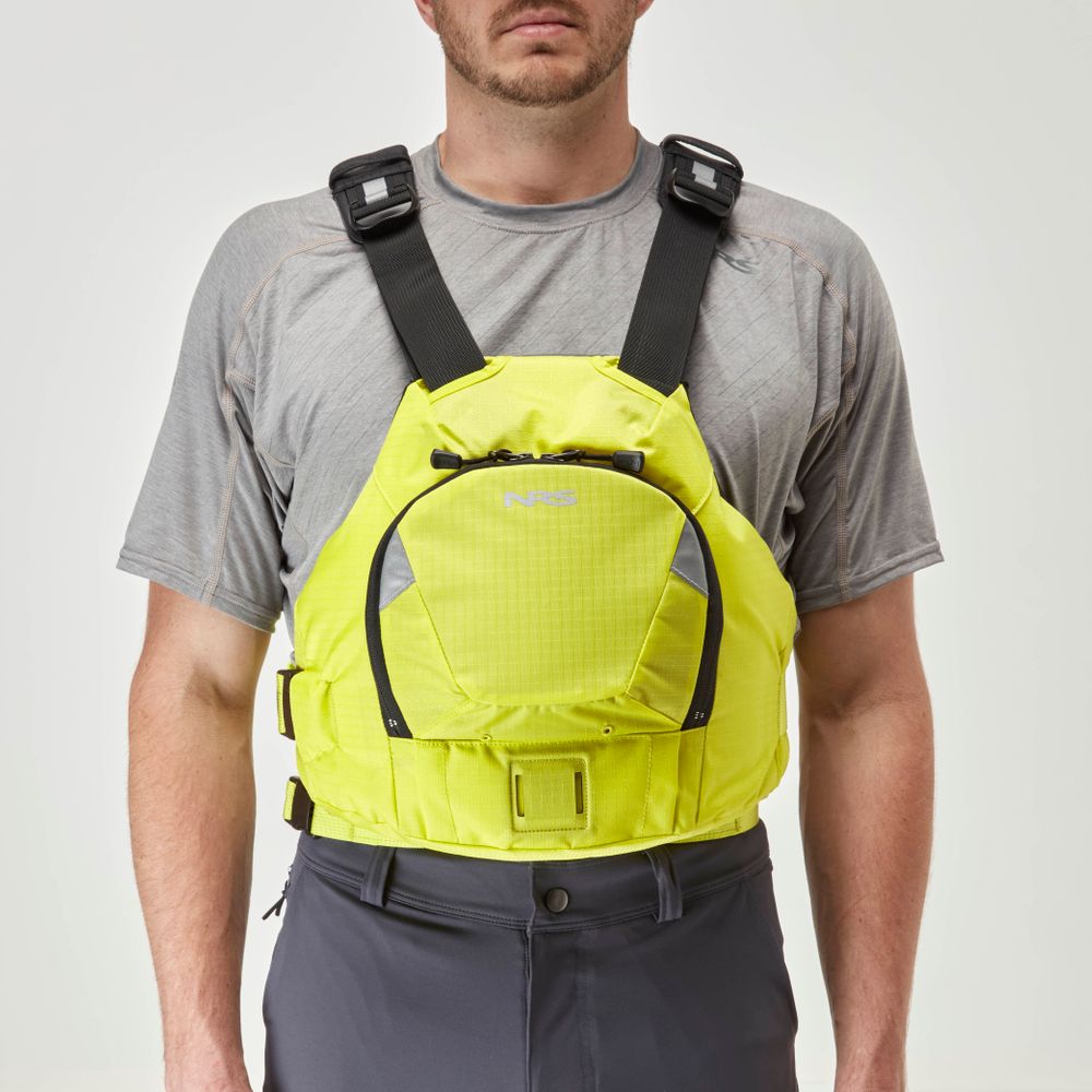 A man in a high-visibility yellow NRS Ninja PFD stands against a plain background, wearing a gray shirt and dark pants.