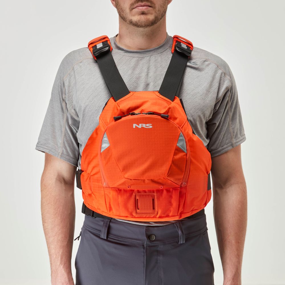 A man in a sleek gray t-shirt wears an orange NRS Ninja PFD featuring the advanced orbit fit system.