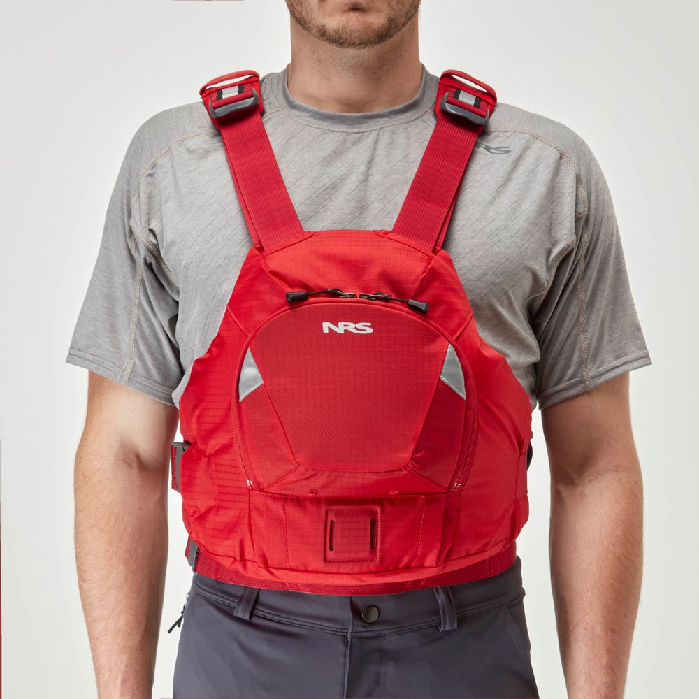 An individual in a gray t-shirt is wearing an NRS Ninja PFD in red.