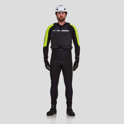 A man faces forward against a plain light gray background wearing the NRS Big Water Guide Hi-Float PFD, a safety helmet, black wetsuit with yellow sleeves, gloves, and boots.