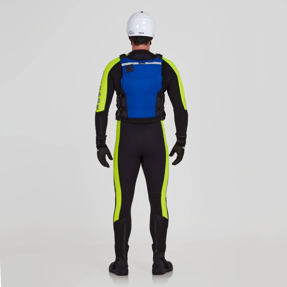 A person stands facing away against a plain light background, wearing a black and neon yellow wetsuit, black gloves, black boots, white helmet, and the NRS Big Water Guide Hi-Float PFD.