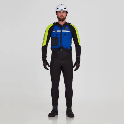 A man stands facing forward against a white background, wearing an NRS Big Water Guide Hi-Float Type III life jacket with a white helmet, blue and yellow jacket, black gloves, wetsuit, and boots.