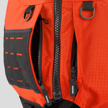 Close-up of an orange backpack with two unzipped compartments, black zipper pulls, and attachment loops—perfect for storing boating safety essentials like the NRS Big Water Guide Hi-Float PFD.