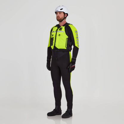 A man wearing the NRS Big Water Guide Hi-Float PFD, a yellow and black wetsuit, gloves, water shoes, and a white helmet stands against a plain white background.