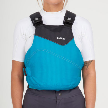 A person wears an NRS Vapor PFD life jacket over a white shirt, showing a tattoo on their upper left arm.