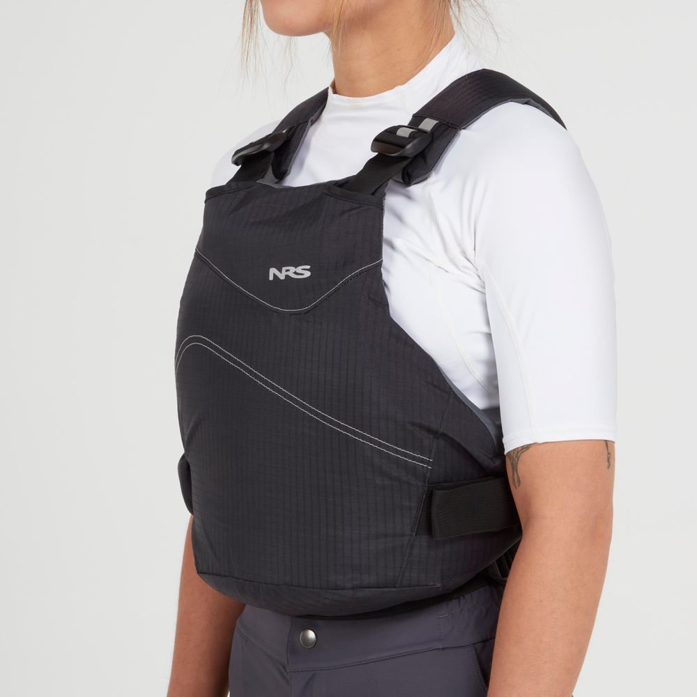 A person in an NRS Vapor PFD life jacket (black) over a white short-sleeve shirt, shown from the side against a plain background—ideal for paddling adventures.