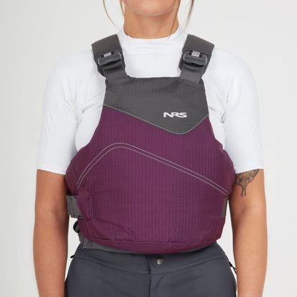 A person wearing an NRS Vapor PFD in purple and gray over a white shirt, shown from shoulders to waist against a plain background—ideal gear for paddling with comfort and safety.