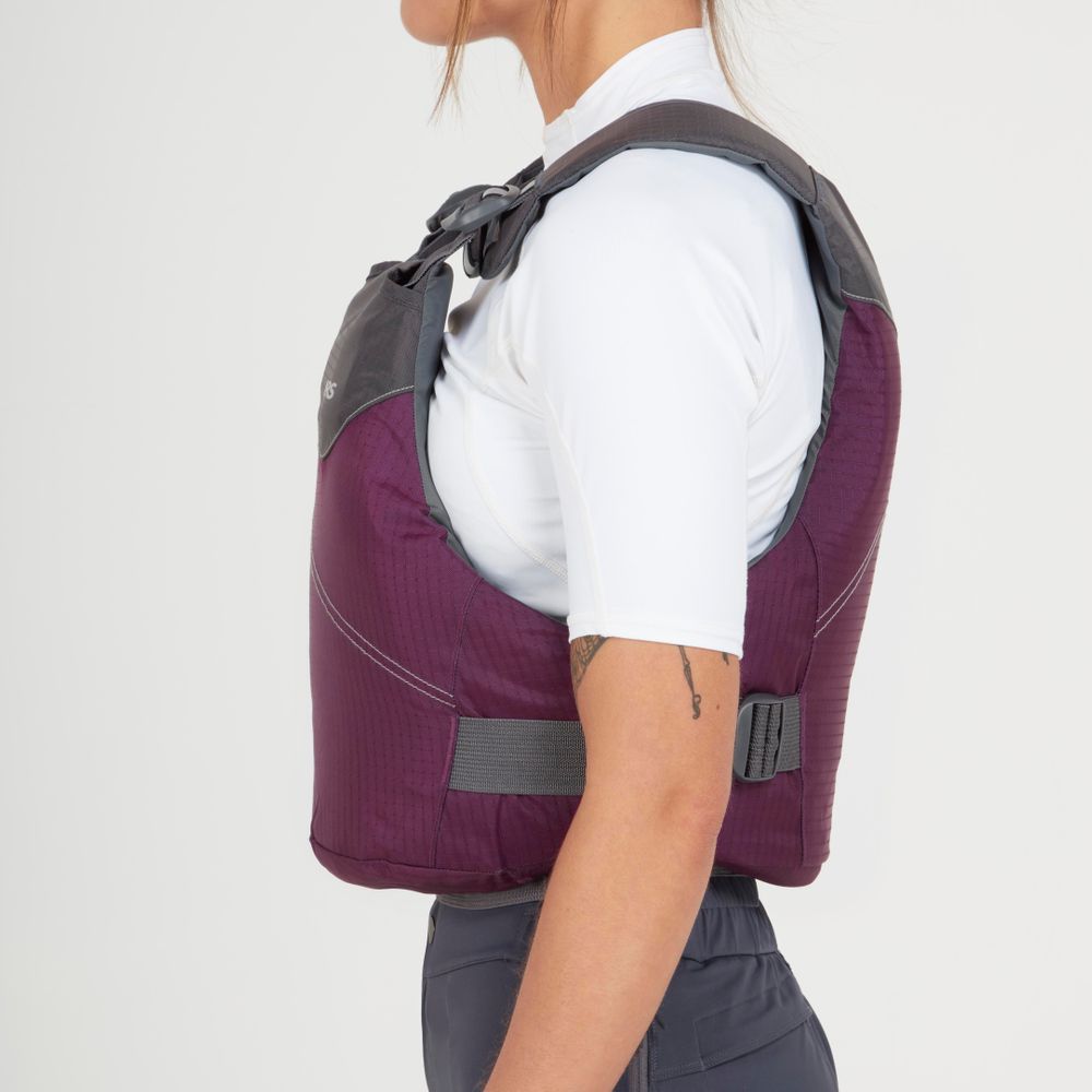 A person in a white shirt and dark pants models the NRS Vapor PFD in maroon and gray, shown from the side against a plain background.