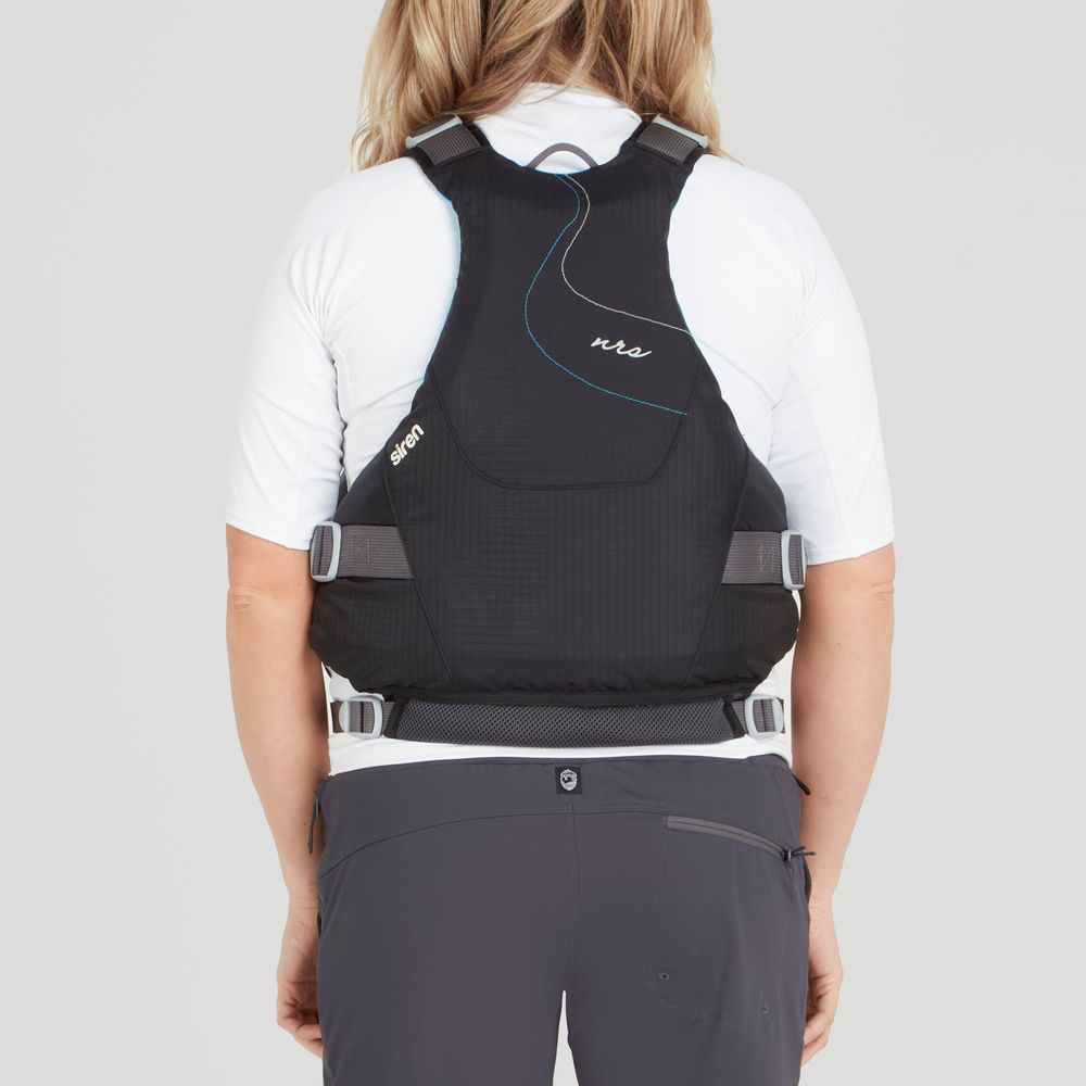 A person wearing a black NRS Siren PFD - Women's life jacket with an adjustable fit and a white shirt is shown from the back.