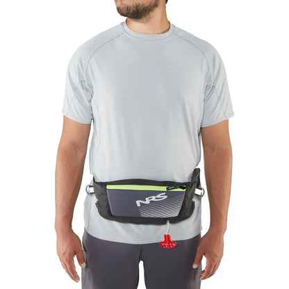 Wearing a gray shirt and shorts with an NRS Zephyr Inflatable PFD waist pack in black and gray, featuring a red pull tab, ideal for paddleboarding adventures.