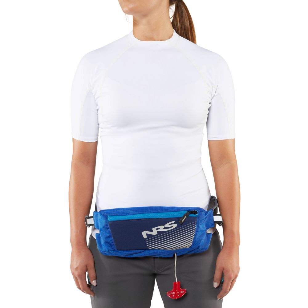 Styled with a blue waist pack featuring "NRS" text and a red cord, along with the Zephyr Inflatable PFD by NRS, this outfit of a white shirt and gray pants ensures they're always adventure-ready.