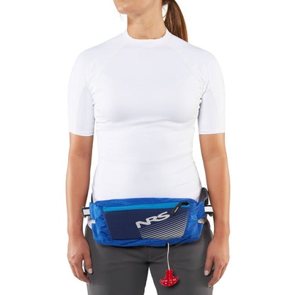 Styled with a blue waist pack featuring "NRS" text and a red cord, along with the Zephyr Inflatable PFD by NRS, this outfit of a white shirt and gray pants ensures they're always adventure-ready.