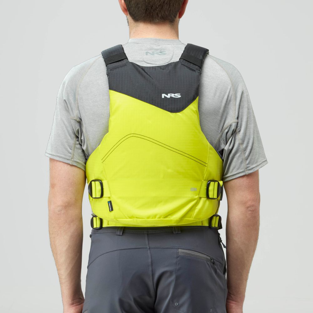 A person wearing a gray shirt and dark pants is seen from behind, wearing a yellow and black NRS Ion PFD, which is a Type III life jacket.